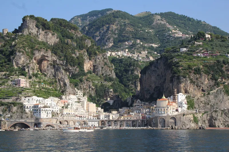 Amalfi Coast: A picturesque town nestled by cliffs on the Amalfi Coast, Italy.