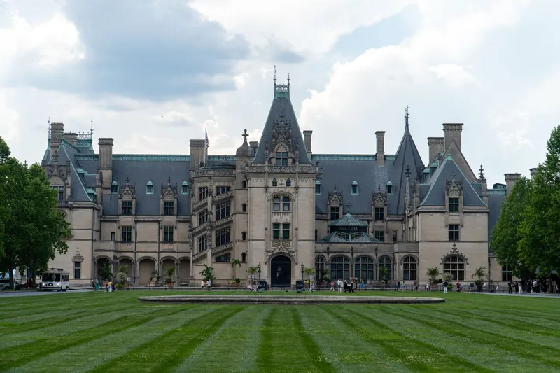 Asheville: Elegant view of the Biltmore Estate, Asheville, NC, showcasing grand architecture and landscaped grounds.