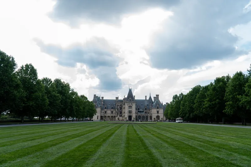 Asheville: Scenic view of Biltmore Estate in Asheville, NC, with dramatic sky.