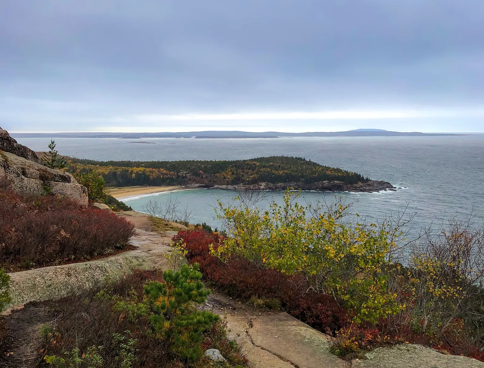 Bar Harbor & Acadia: A breathtaking view of Bar Harbor, Maine, with fall foliage and the ocean.