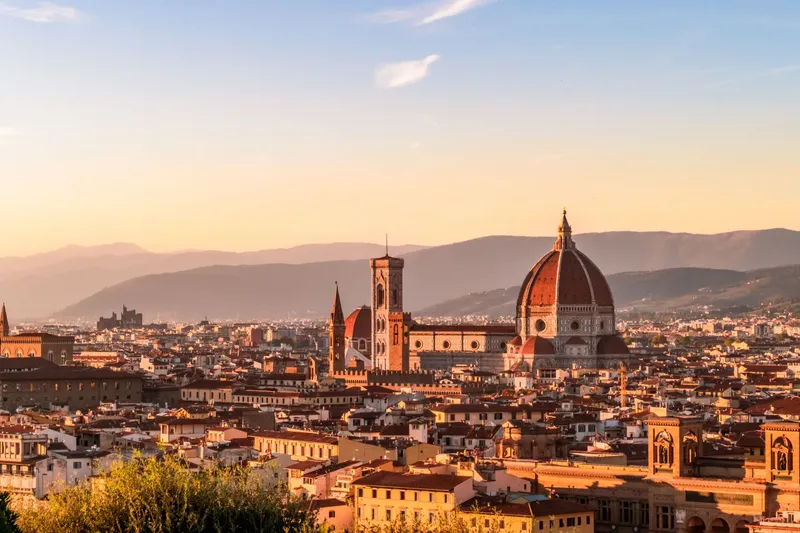 Florence & Tuscany: Captivating sunset over Florence, showcasing the iconic Duomo and Tuscan skyline.