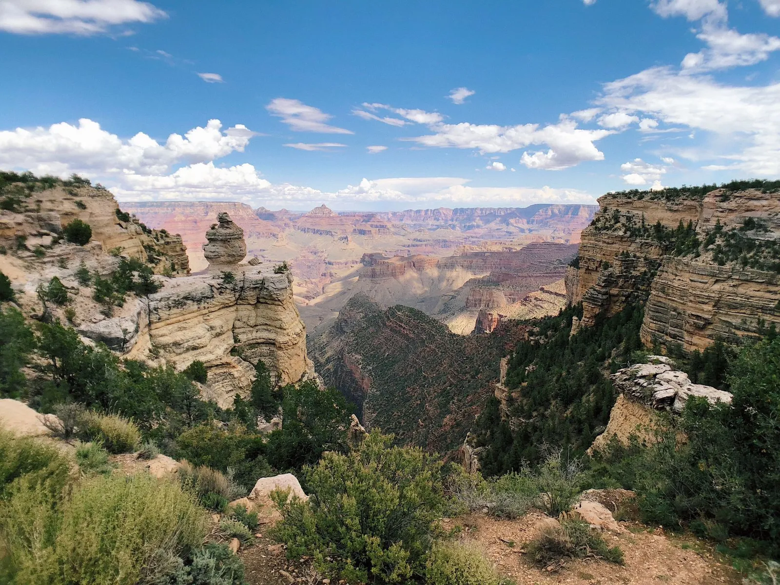 Grand Canyon: Breathtaking landscape of Grand Canyon West under a clear blue sky.
