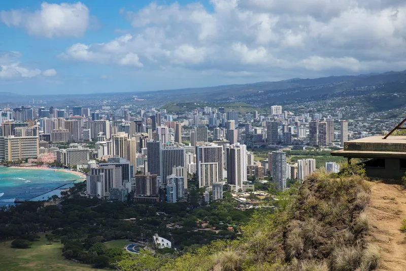Honolulu & Oahu: Discover the stunning skyline of Honolulu with ocean views from a scenic overlook.