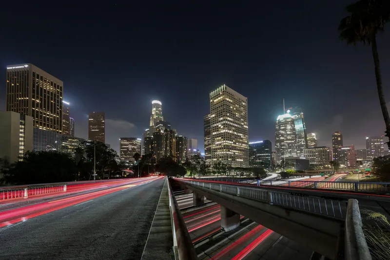 Los Angeles: Vibrant long exposure of Downtown Los Angeles skyscrapers at night, showcasing the city skyline.