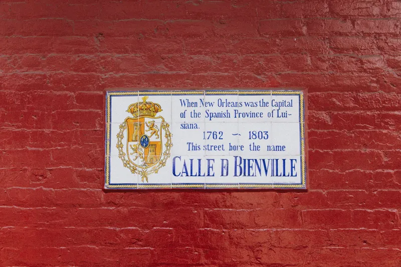New Orleans: Street sign on a red brick wall, New Orleans, Spanish era history.