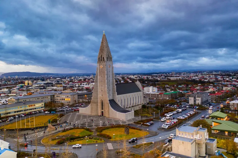 Reykjavík: A stunning aerial view of Hallgrímskirkja and the cityscape of Reykjavik, Iceland at daytime.