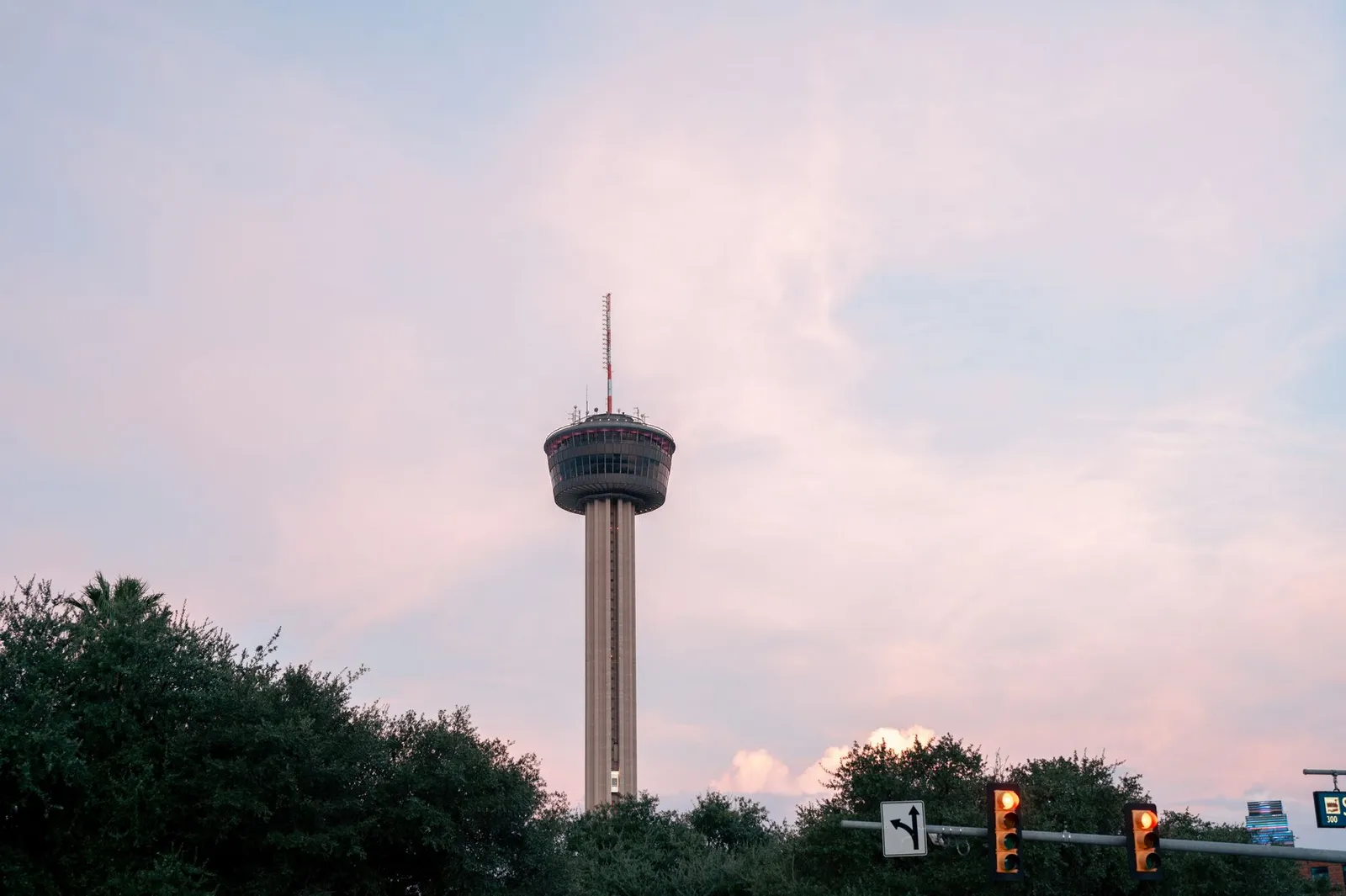 San Antonio: The Tower of the Americas in San Antonio stands tall against a pastel sky at dusk.